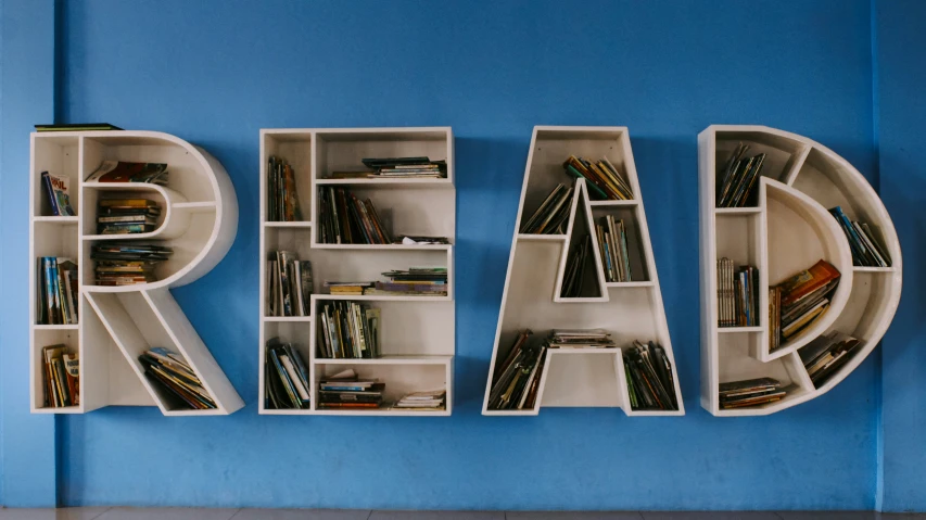the word read written in large letters made out of books