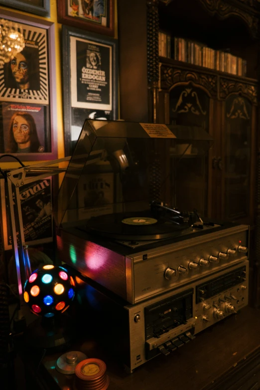 there is a old fashioned radio and a record player on top