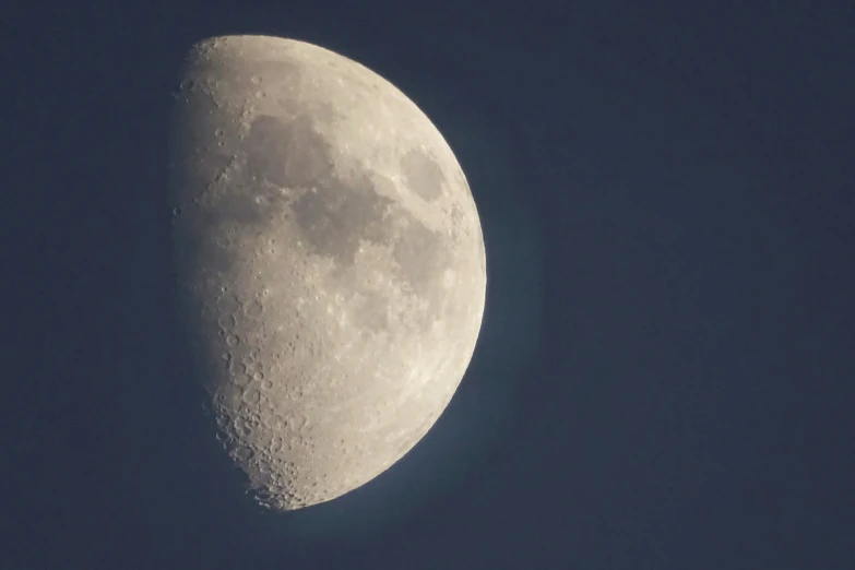 the moon with a slightly faint side visible