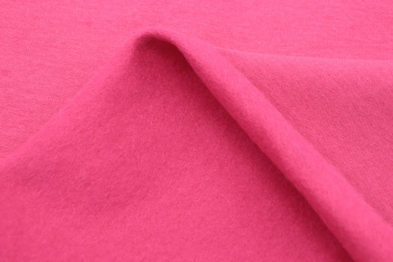 a close up image of pink colored flee fabric