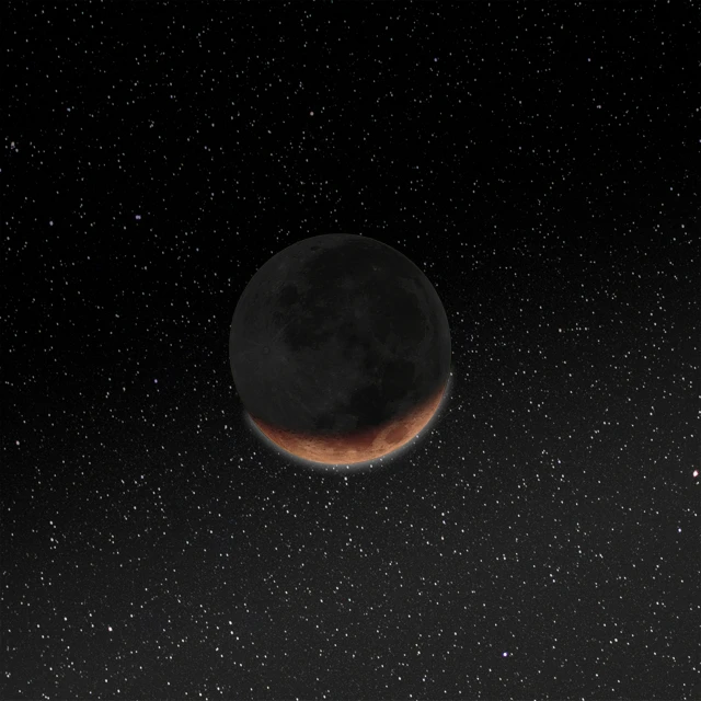 a moon appears to be glowing red in the night sky