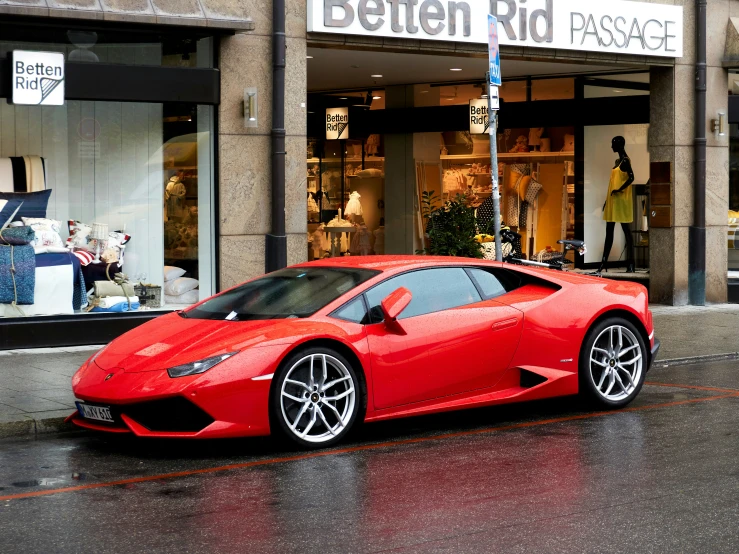 a red car parked in front of a store