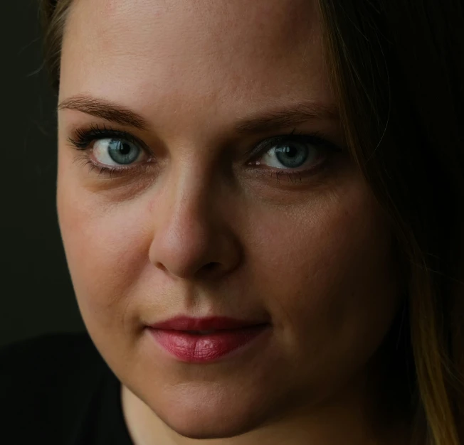 close up of the blue eyes of a woman