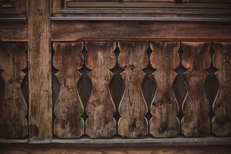 the top panel of an old wooden building