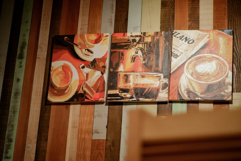 some picture frames are displayed with a wooden panel