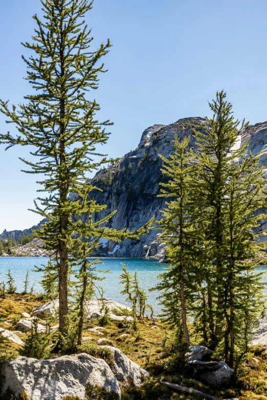 the view of the mountains surrounding a body of water