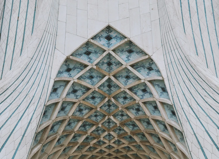 an ornate design on the side of a building