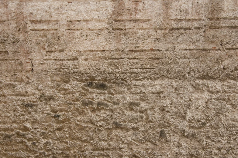 a wall with a brown pattered design on it
