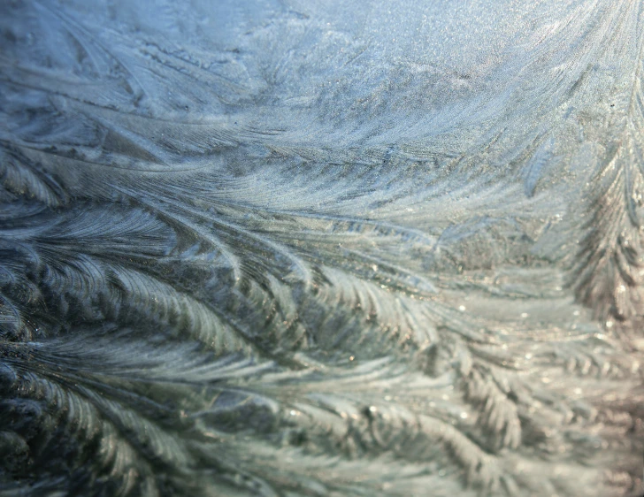 a view through the glass of a frosty window