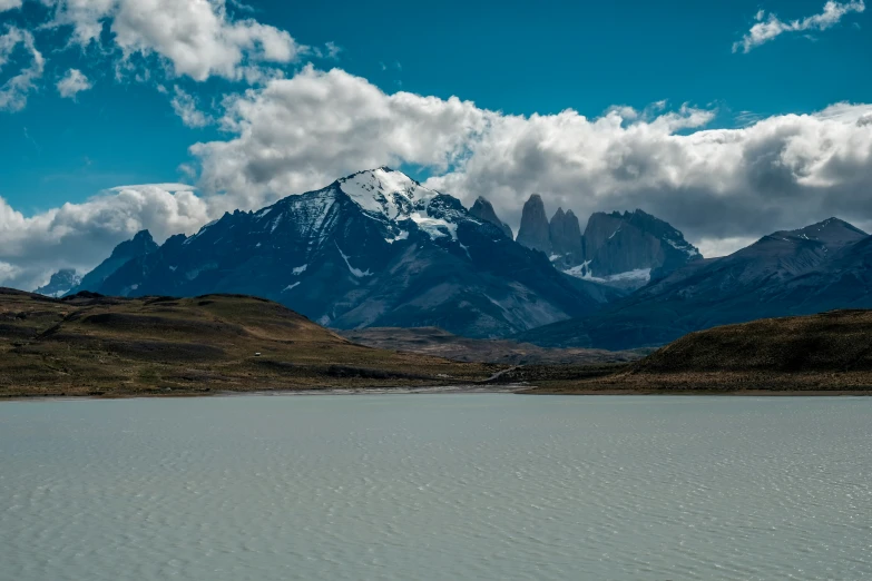 the mountains are covered in snow and water