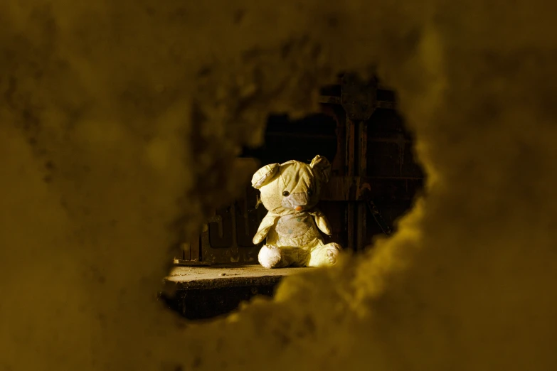 a large teddy bear sitting on top of a table