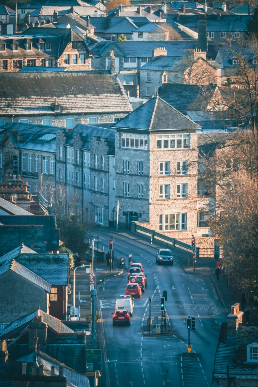 cars and a bus are parked along a road