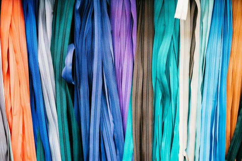 colorful scarves displayed in a shop window