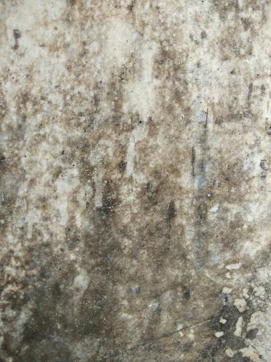 a cement texture that is grey and has stains