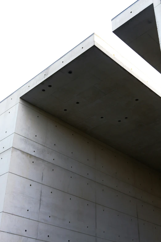 concrete structure with cement corner and sky in background