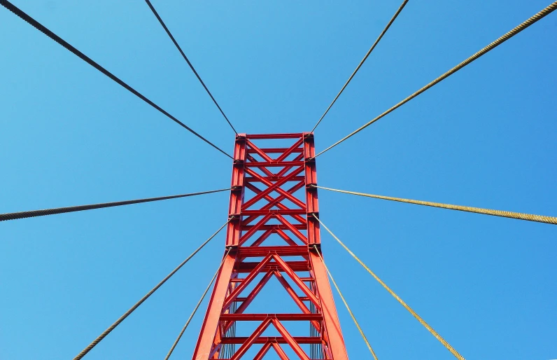 the top of a red and orange bridge