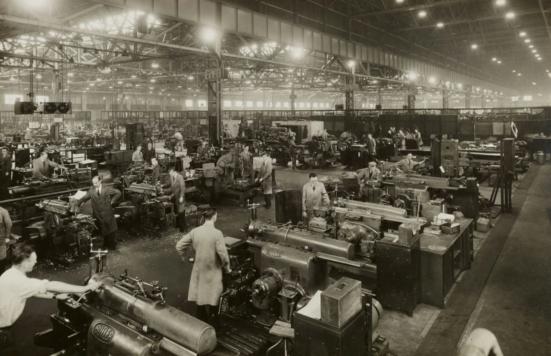 a black and white po of factory workers