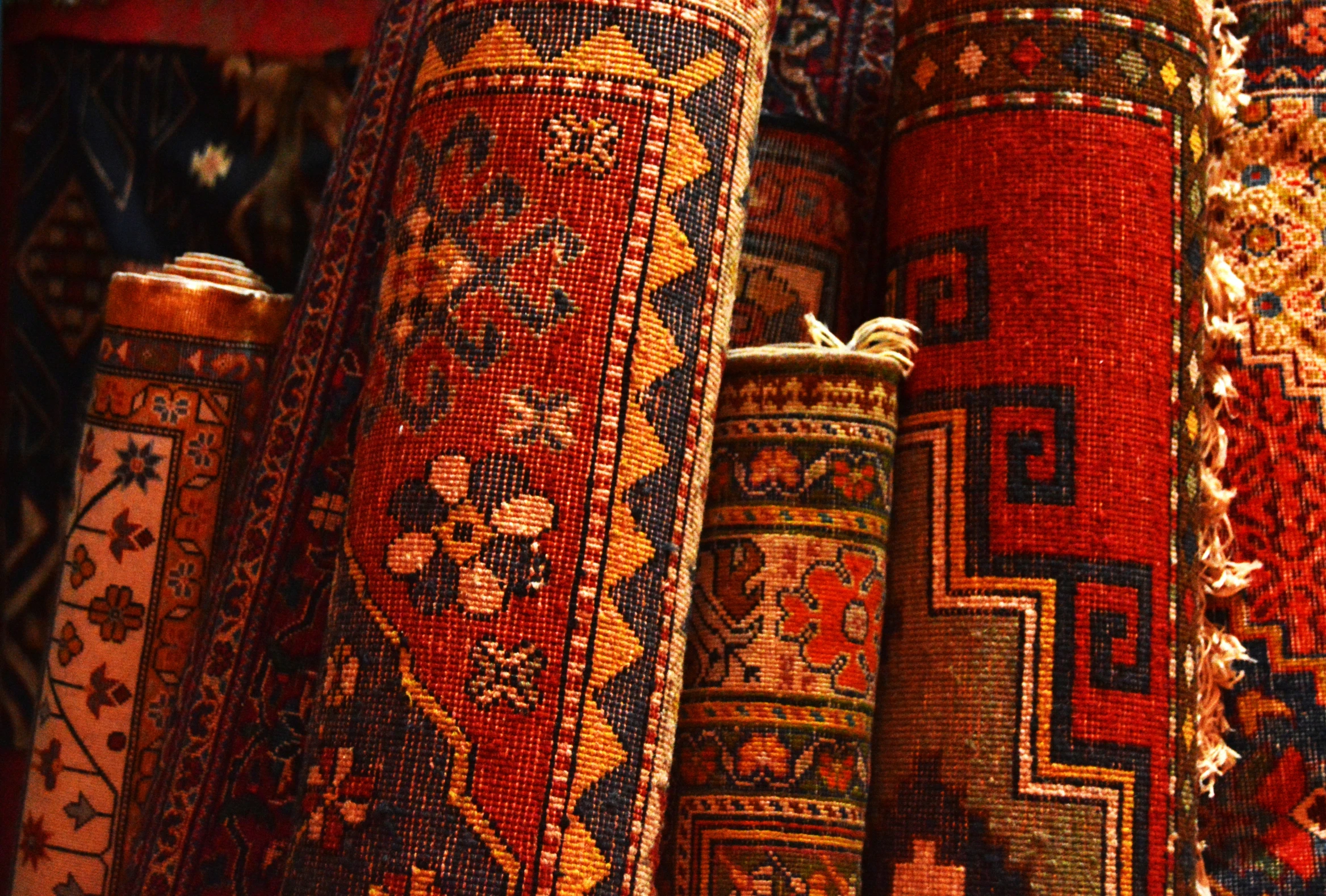 some colorful carpets in an oriental style and colors