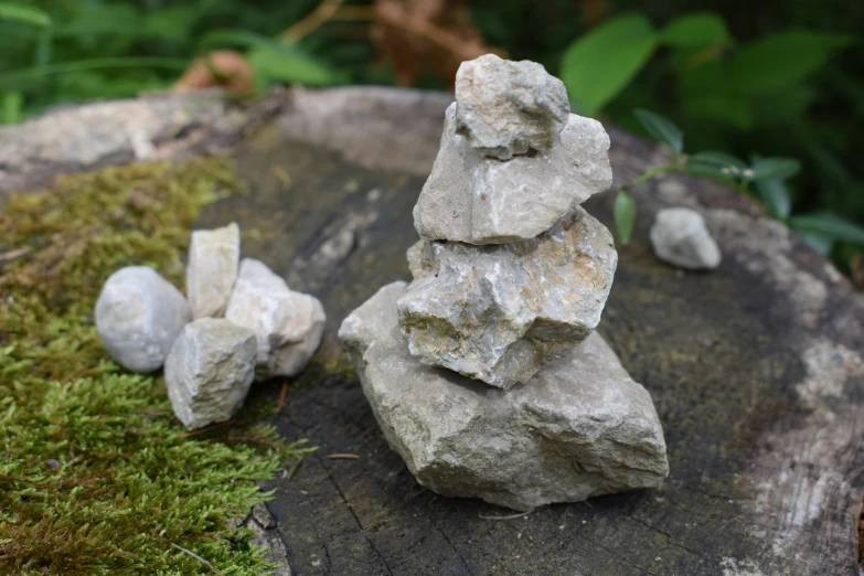 a rock stacked on top of another pile of rocks