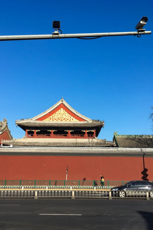 this chinese building is seen against a blue sky