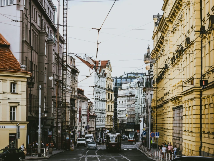 street view of vehicles, scaffoldings and buildings