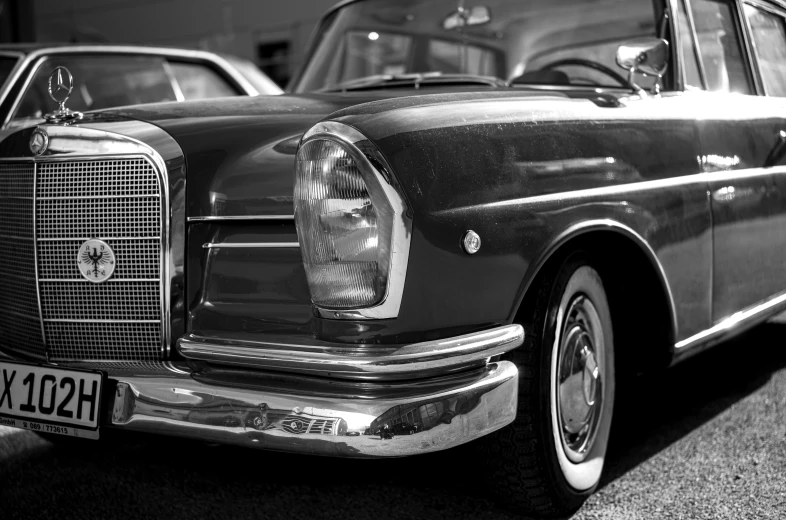 black and white pograph of a mercedes benz estate car