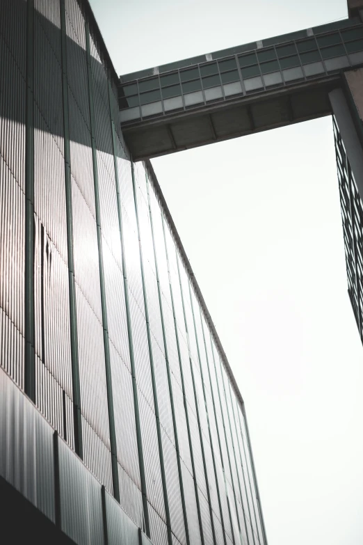 a very tall building with some type of metal design