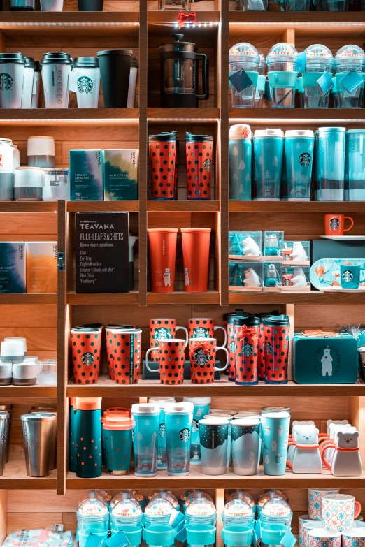 shelves full of cups and containers are displayed