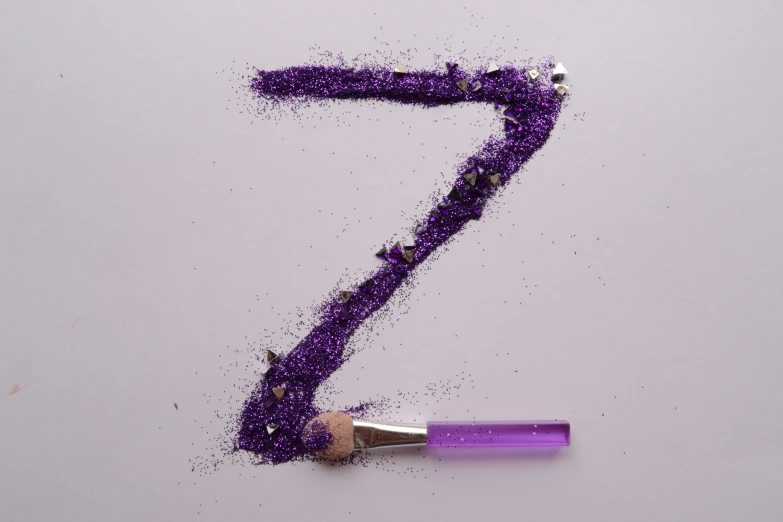 the number seven is made of glitter and matchestick