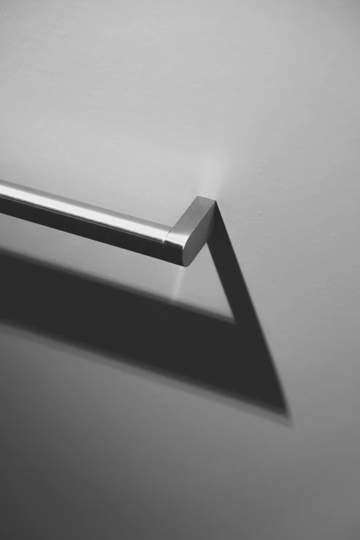 a piece of metal standing up against a wall