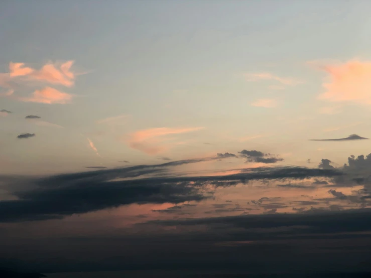 many clouds are in the sky at sunset