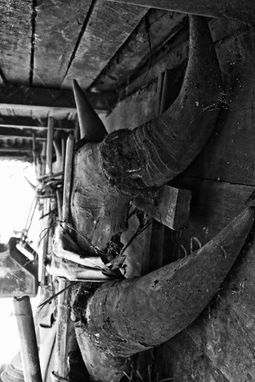 old and worn metal objects attached to a wall