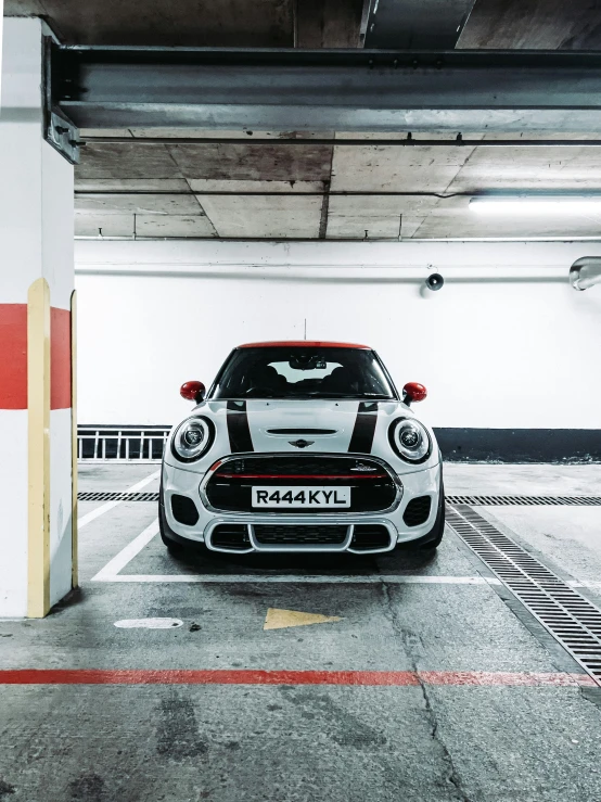 a porsche car is parked in a parking garage