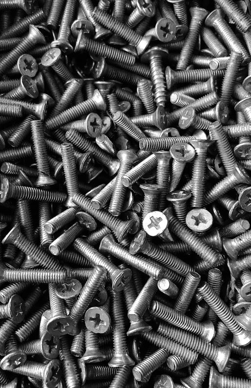 the pile of screws is full of nuts