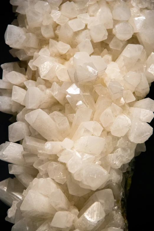 a cluster of rocks in the center of a black background