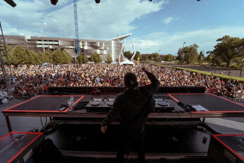 a man is at a concert on stage