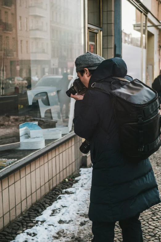 a man with a suitcase is on the side walk