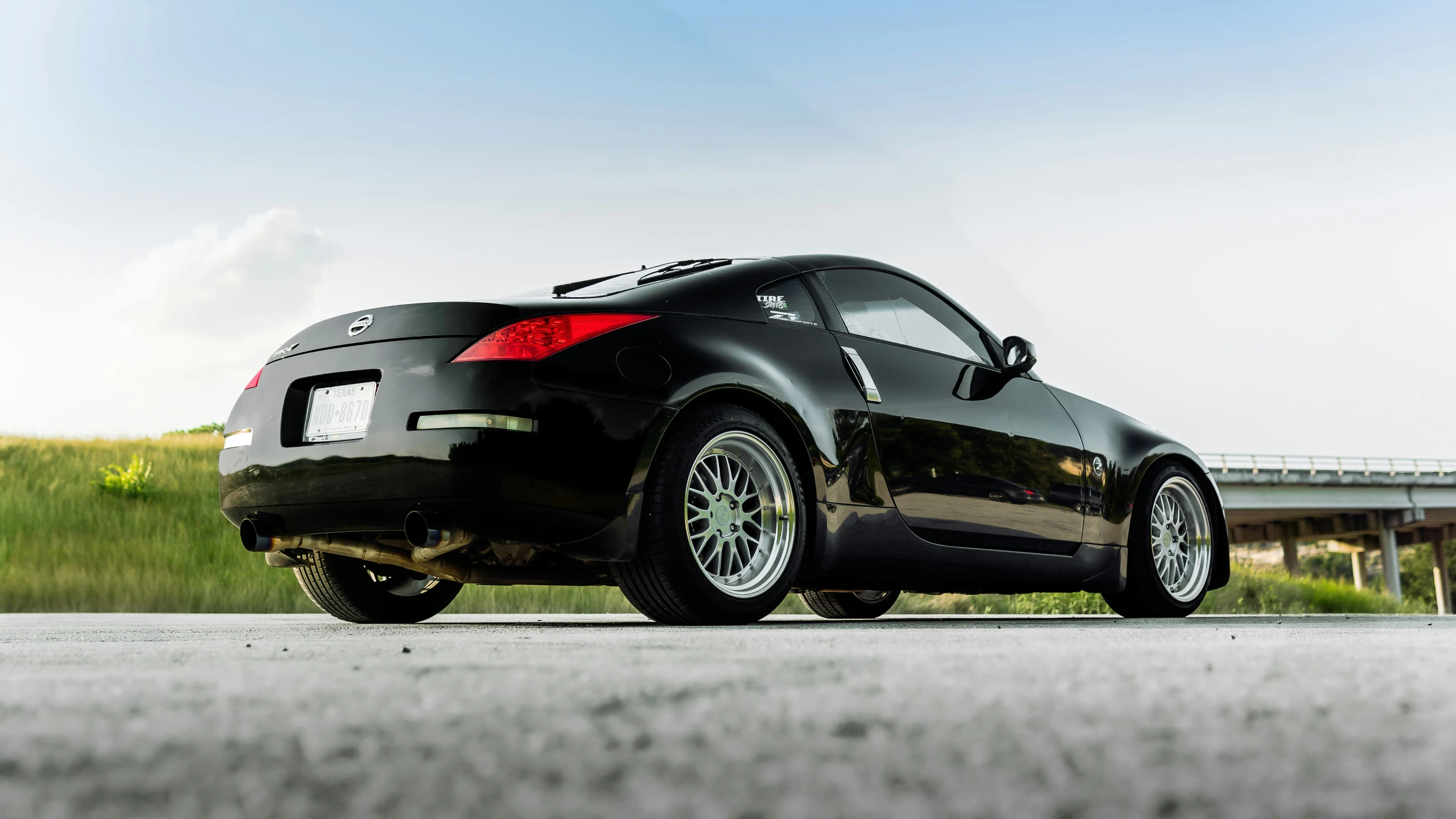 a black car on the road during the day