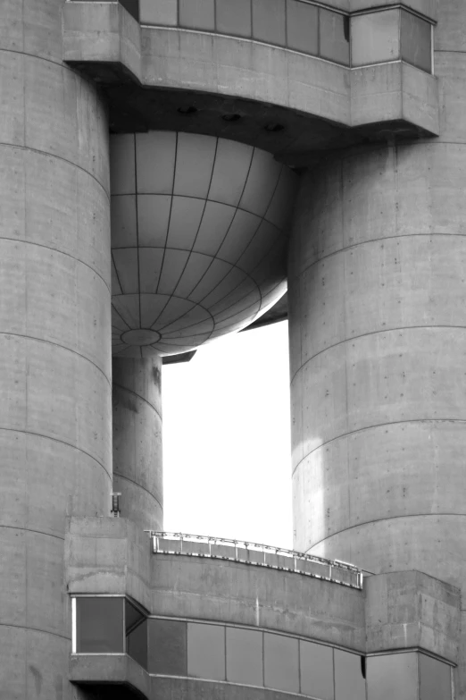 two large towers of concrete, one facing downward