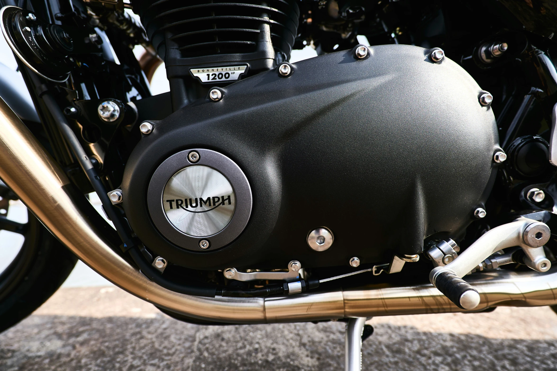 closeup s of the engine cover on a motorcycle