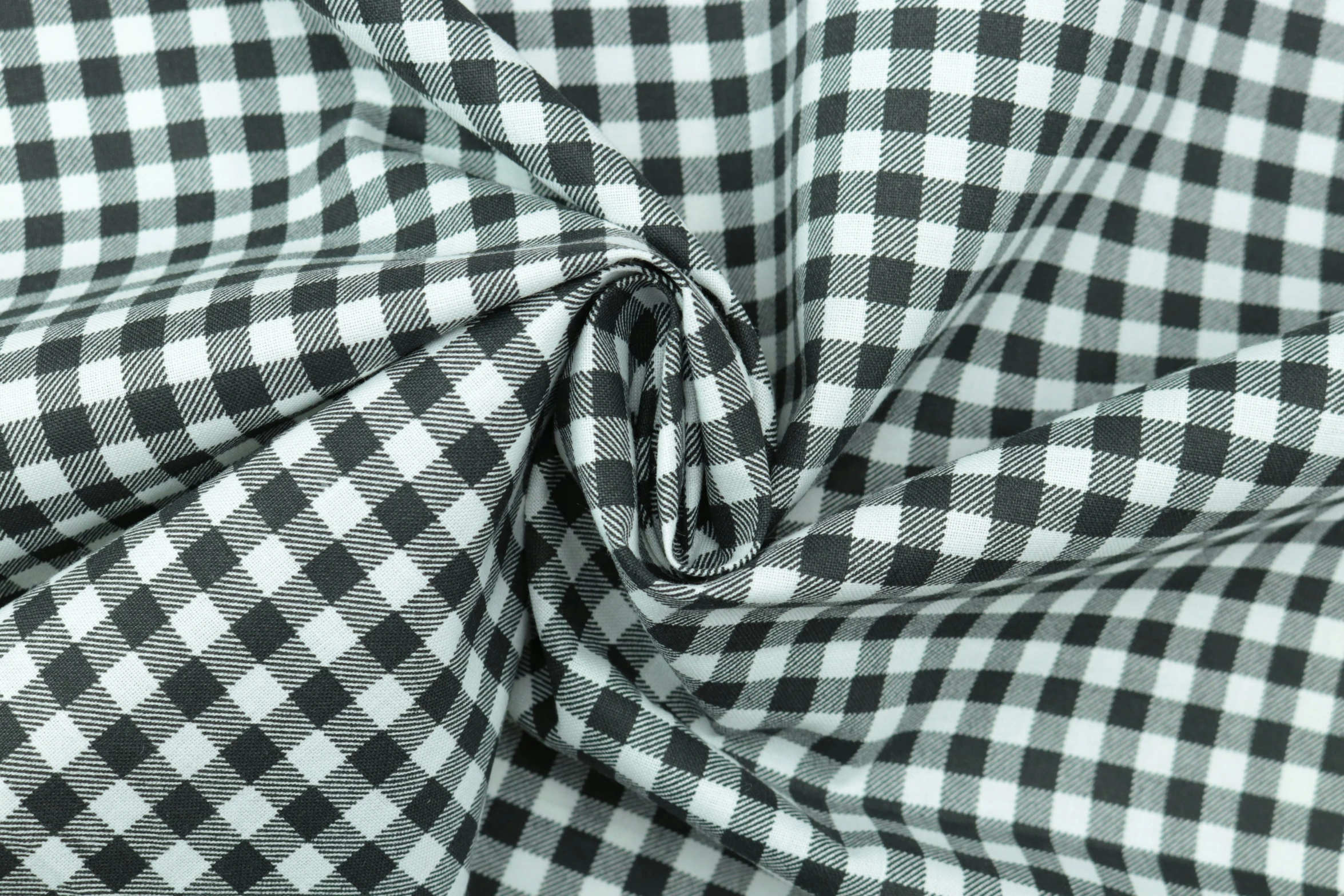 black and white checkered umbrella, made from fabric