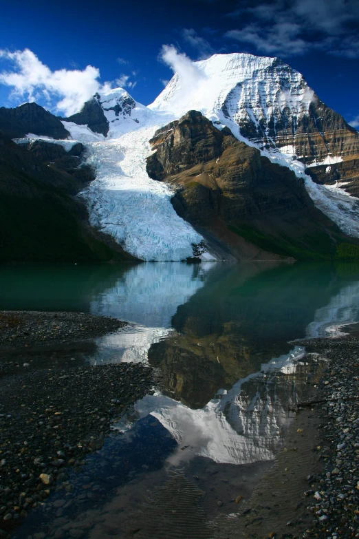 a big mountain and the snow that it is melting off