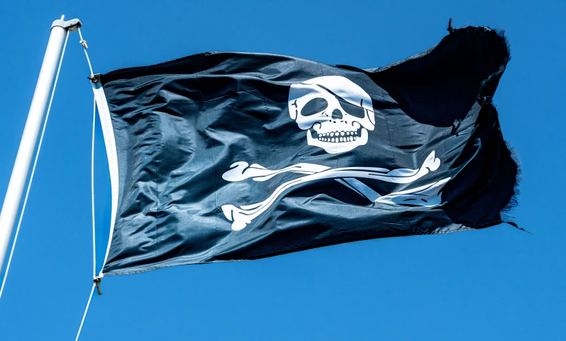 a pirate flag flying in the sky