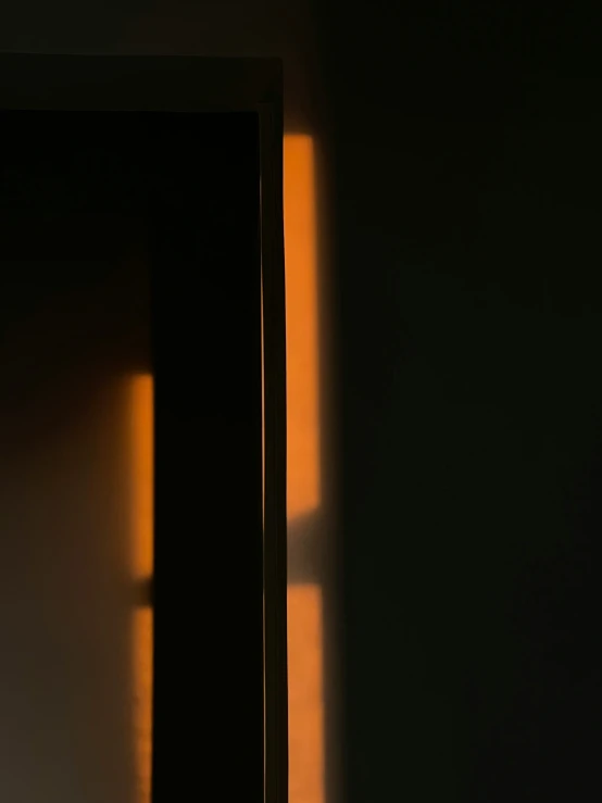 an open door shows the light coming through the windows