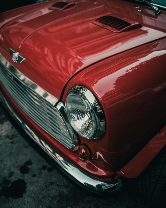 a red car parked in a parking lot