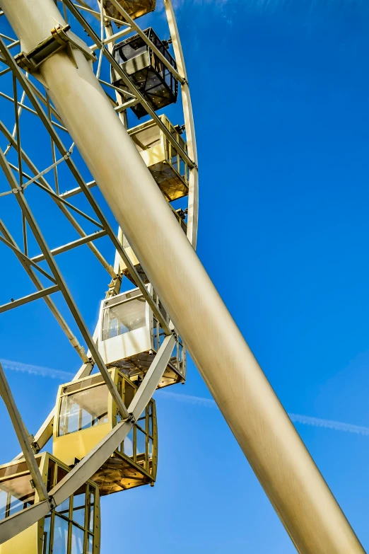 an amut wheel sitting against a blue sky