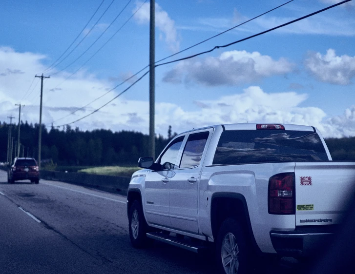 two trucks passing each other on the road