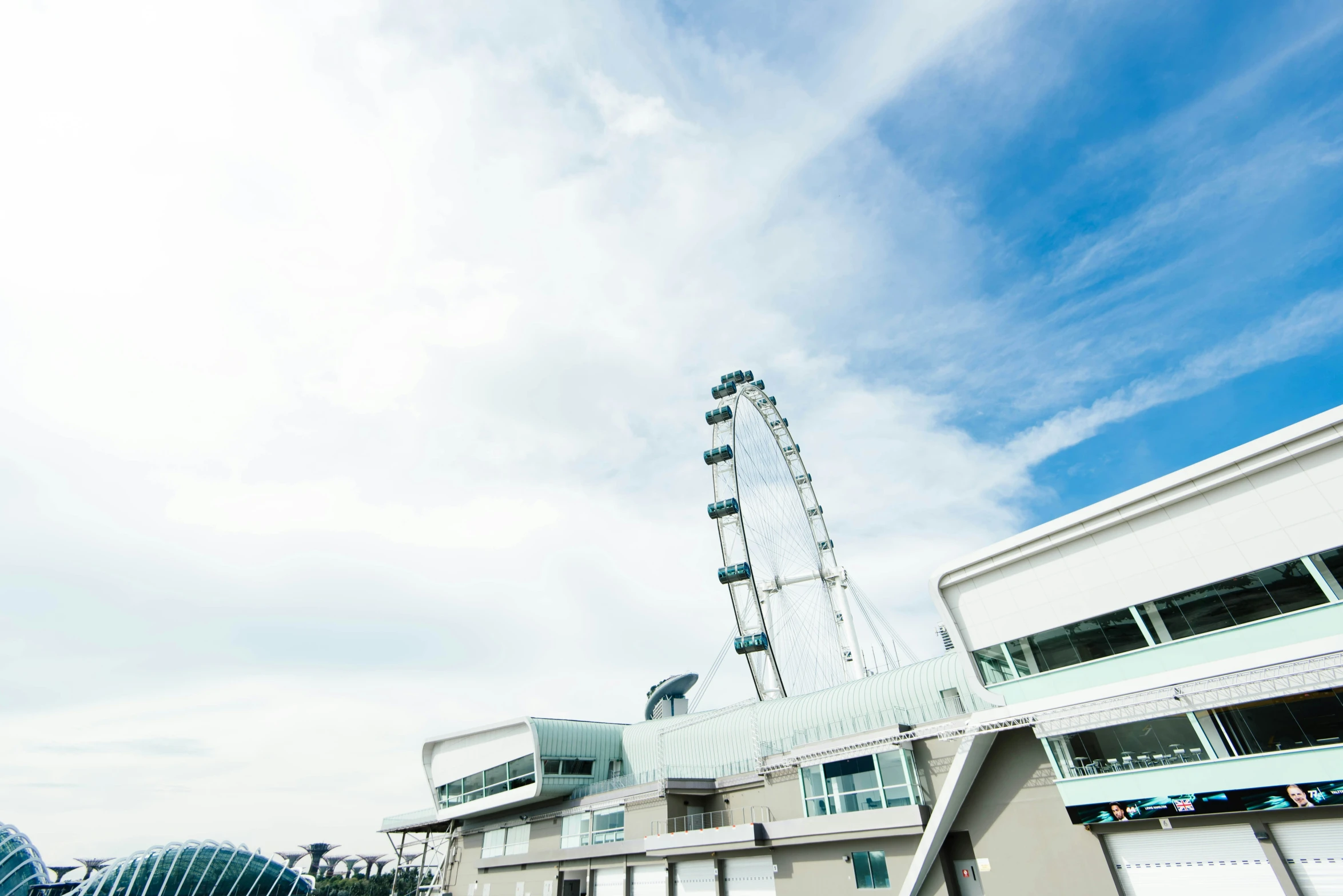 a building with an amut wheel next to a building