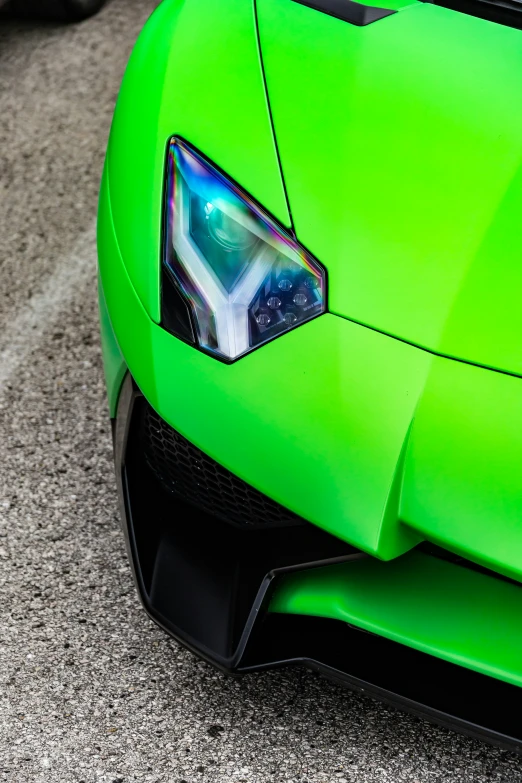 the rear end of a green sports car