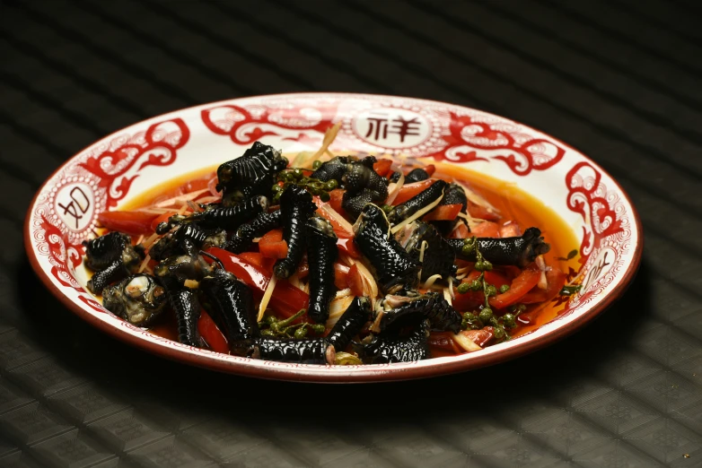 a dish with meat on top is displayed